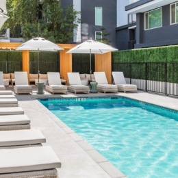 Resort style pool pool with lounge seating