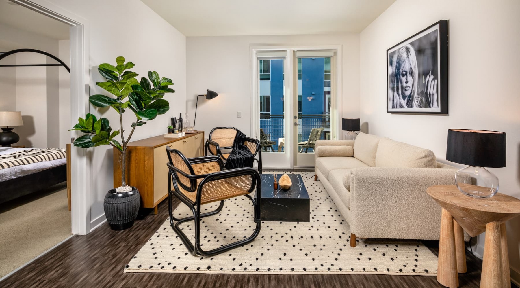Be DTLA Lifestyle interior living room with couch, spacious areas and easy access to the bedroom